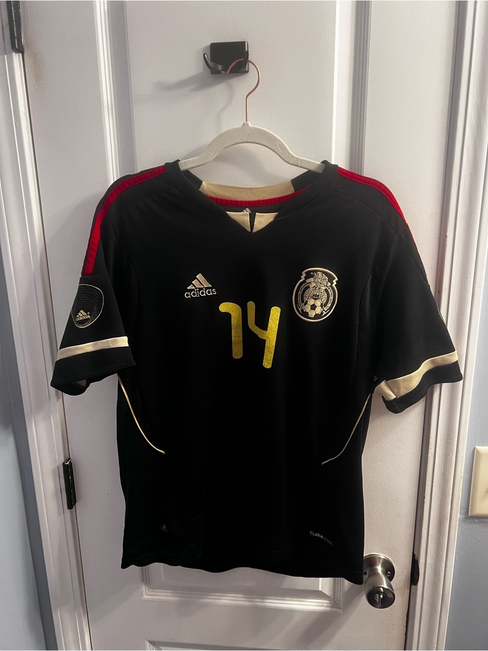adidas Black Mexico Soccer Jersey with Gold Accents and Red Trim